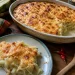 Gratin de papaye verte réunionnais gratiné doré, servi dans un plat en céramique avec une portion à part